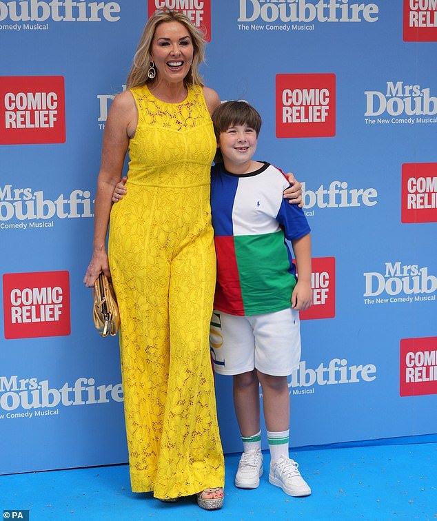 The actress (pictured with her son Jaxon) admitted she hasn't had a date since Christmas