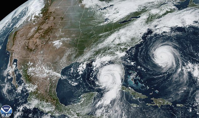 Satellite photo from the National Oceanic and Atmospheric Administration shows Hurricane Idalia, center, approaching Florida's Gulf Coast