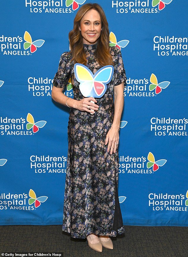 Nikki DeLoach opted for a short-sleeved patterned dress for the annual charity function