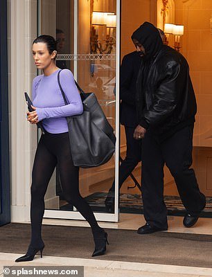 Kanye West's wife Bianca Censori was surprisingly modestly dressed as the couple stepped out in Paris on Saturday