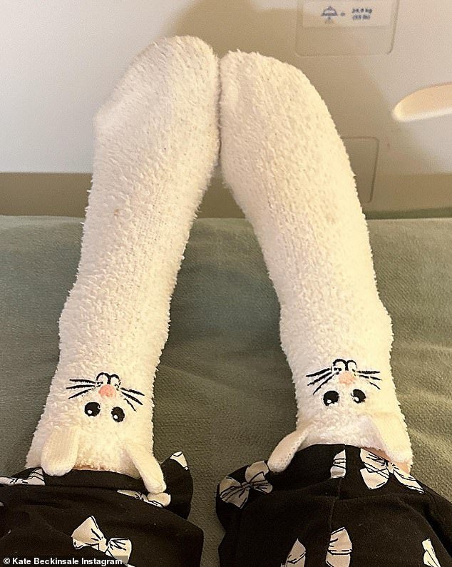 The two snaps show a pair of legs wearing fluffy white socks with bunny faces, as the Underworld star captioned the post: 'Happy Easter'