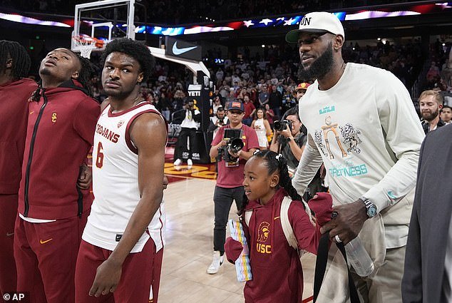LeBron James (R) admitted he gets anxious watching his son, Bronny, play at USC