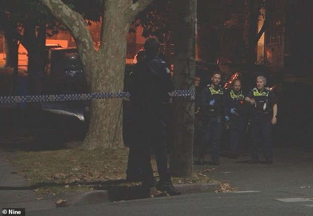 A man has been rushed to hospital after being found with serious injuries in a backyard in Balwyn, Melbourne (photo: officers on scene)