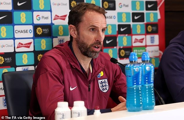 Gareth Southgate insisted on Friday evening that the controversial logo on the collar of the New England shirt is not a St George's flag, claiming it was just a 'quirky design feature'.