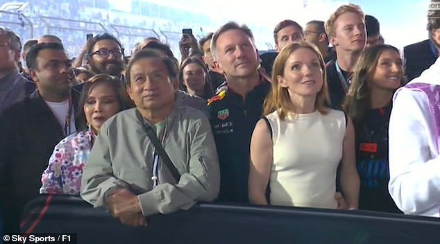This is the moment F1 boss Christian Horner puts his hand on his wife's waist.  Body language expert Judi James said it was a 'dramatic signal of both affection and lasting sexual attraction'