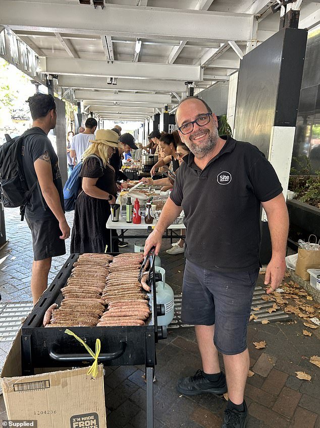 Site Pizza Bar owner and founder Glen Mezei has made it his mission to give back to the community by offering free meals to Aussies struggling with homelessness and the cost of living (photo: Mr Mezei helps the Chopping Circle in Martin Place)