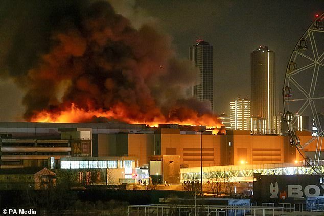 On Friday evening, a huge fire can be seen above the Crocus town hall after the terrorist attack