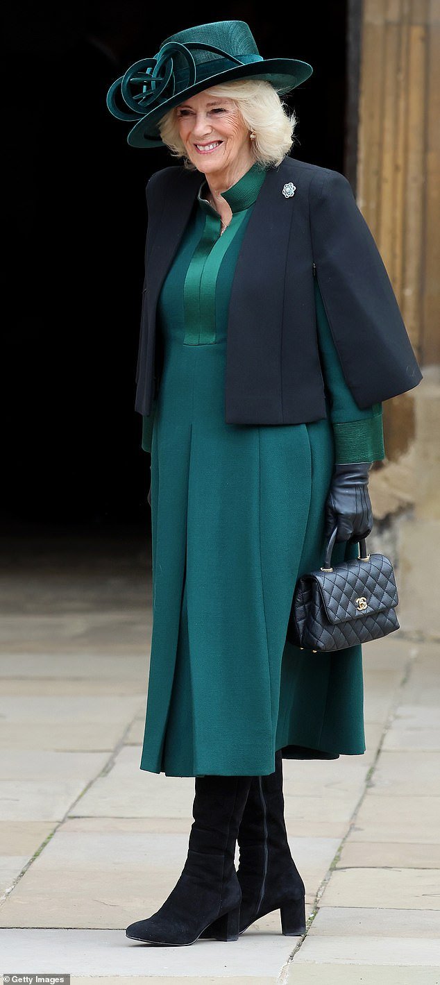 A queen in green!  Camilla looked elegant in a racing green dress with matching hat, paired with black suede knee-high boots and a black handbag