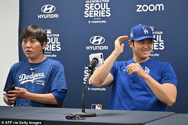Shohei Ohtani has hired a major law firm over allegations against Ippei Mizuhara (left)