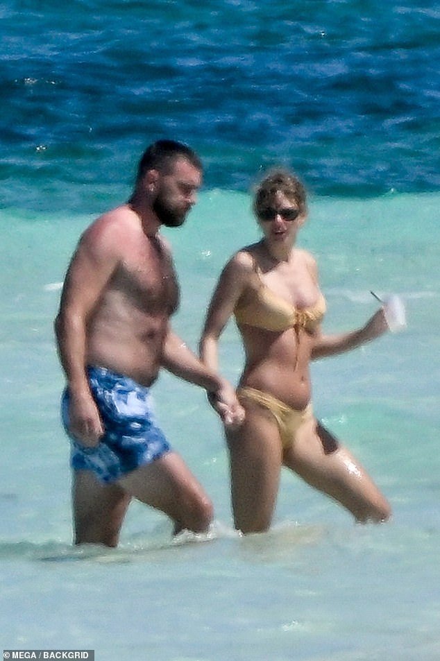 Swift and Kelce were spotted vacationing along the beach in the Bahamas after the singer ended her concert series in Singapore