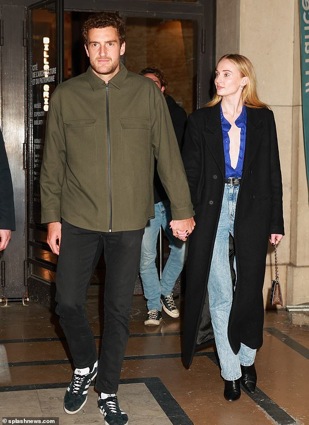 Sophie Turner, 27, and boyfriend Peregrine Pearson, 29, were spotted holding hands after a romantic dinner in Paris during the city's Fashion Week on Monday