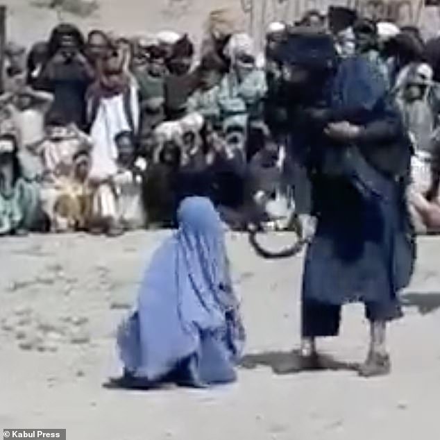 Gruesome footage of a screaming Afghan woman cowering as she is stoned by the Taliban