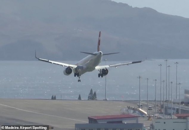 TAP Air Portugal's Airbus is seen in terrifying footage as it soars through the sky before making an unstable landing at Madeira airport