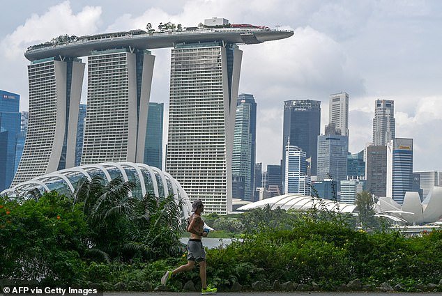Australia is the top destination for real estate investors in Singapore as the millionaires look for someone to retire to or send their children to college (pictured is Marina Bay Sands in Singapore)