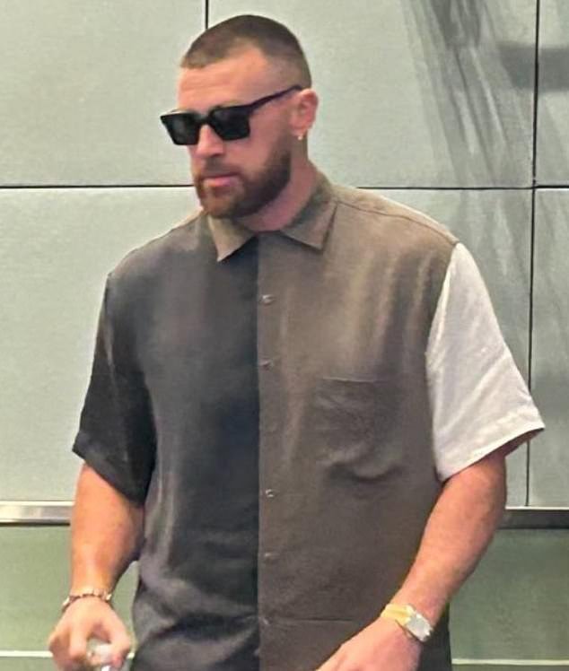 Travis Kelce drove Taylor Swift fans wild on Wednesday while wearing a shirt with the color palette of her new album The Tortured Poets Department