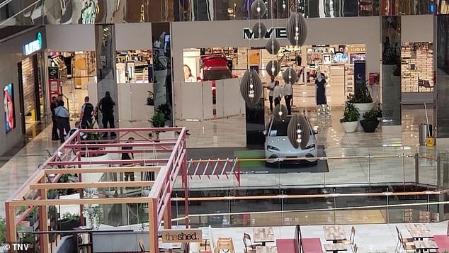A BYD electric vehicle reportedly reversed and crashed into a glass railing while charging at Westfield Liverpool Shopping Center on Saturday