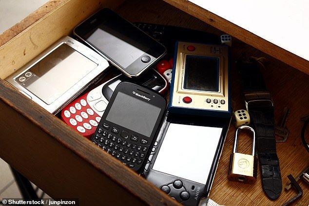 Visit any household in Britain and there's a good chance you'll discover a 'dooms drawer' containing old gadgets, mysterious keys and random screws.  While most of us don't think twice about what's lurking around the corner, a new report has revealed that we may be sitting on a goldmine of 'tech treasures' (stock image)