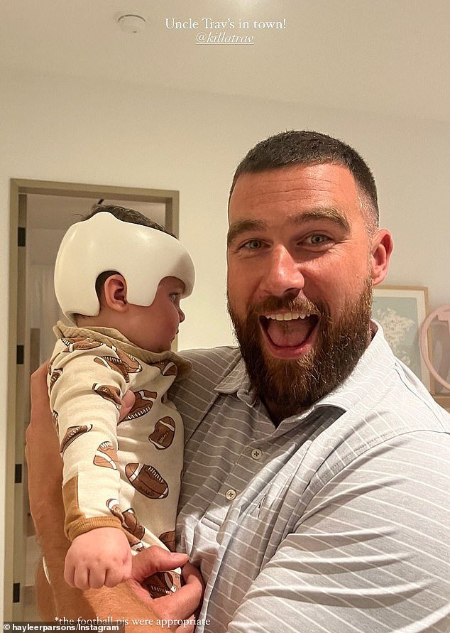 Travis Kelce visited friend Chandler Parsons' home and posed with his son Chrome
