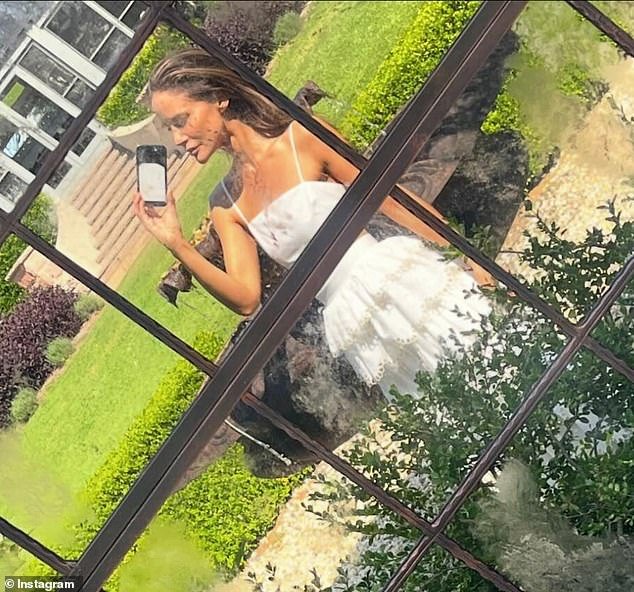 Several images in her social post showed her pensively walking through the garden in a series of romantic poses