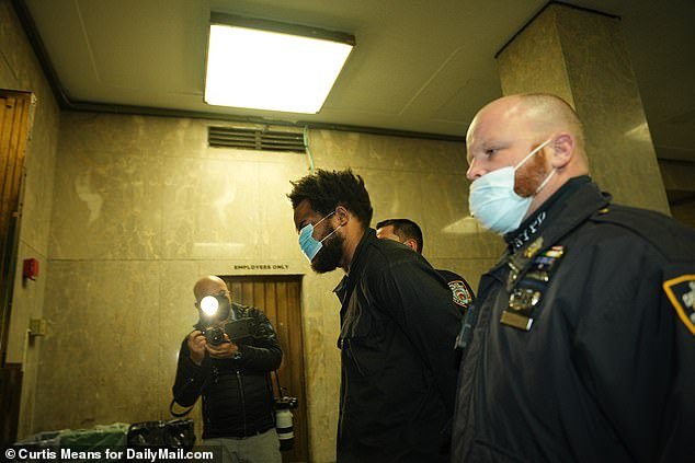 Israel used a coronavirus mask to obscure his identity when he appeared in court for the January attacks