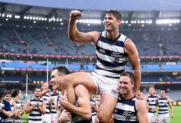 On the field, Hawkins - who was celebrating his 350th career game in the AFL - scored four goals in Geelong's 36-point win over Hawthorn