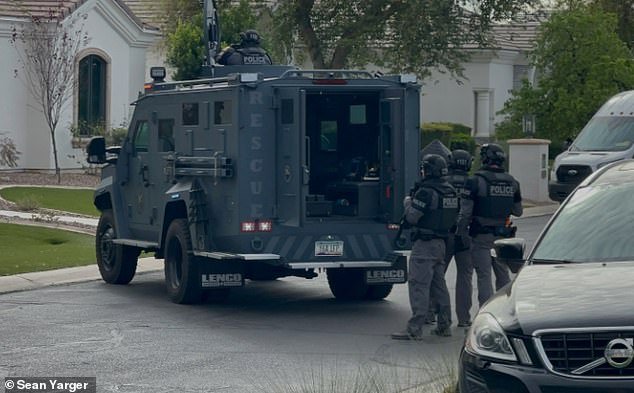 Police are seen trying to raid Renner's home earlier this month to execute an arrest warrant, but no one is found there