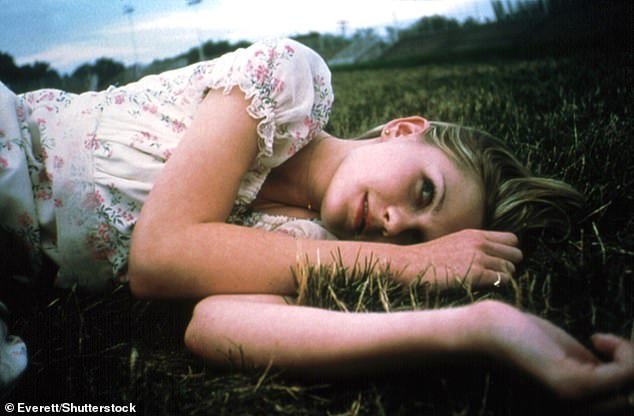 Kirsten said: 'I was only able to avoid that predatory side of the business because my mother was always there wherever I went' (pictured in a still from Virgin Suicides, aged 16)