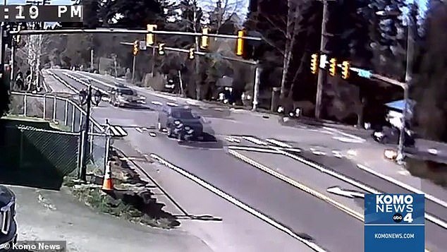 Surveillance footage shows 18-year-old Jones driving his 2015 Audi A4 at breakneck speed before crashing through the van at an intersection in suburban Seattle on March 19.