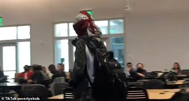 Footage from the lecture, in which Gray-Garcia kept her face covered