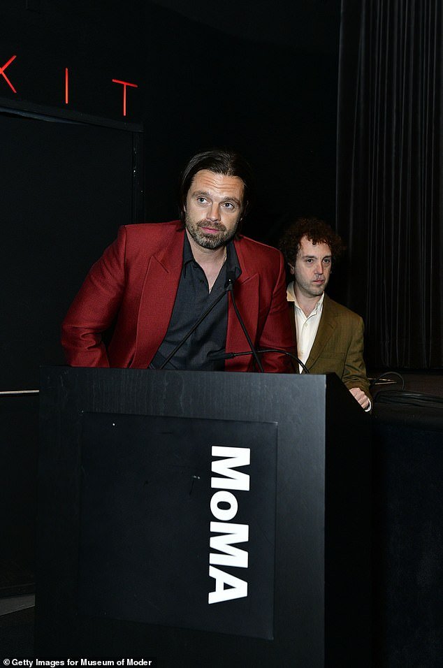 Stan appeared on a stage next to his collaborator on the film