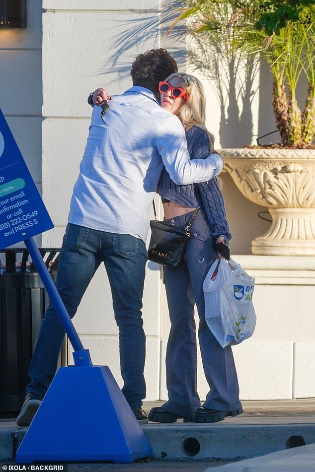 The 90210 star, 50, ventured to Rite Aid in Calabasas and was seen leaving with a bag in hand, before sharing a hug with her male companion