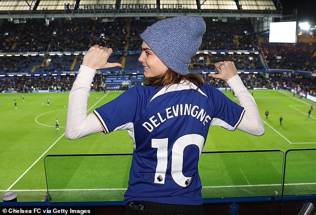 The British actress wore a personalized football shirt, which had her surname engraved on the back