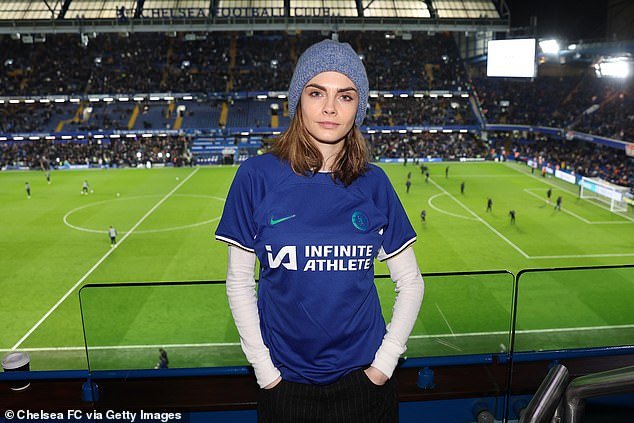 The talented star wore a white long-sleeved top under her blue home kit