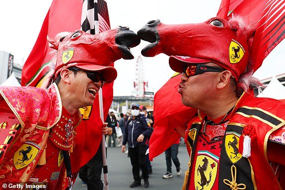 SUZUKA, JAPAN – APRIL 06: A few Ferrari fans show their support with horse hats prior to qualifying ahead of the F1 Grand Prix of Japan at Suzuka International Racing Course on April 6, 2024 in Suzuka, Japan.  (Photo by Peter Fox/Getty Images)