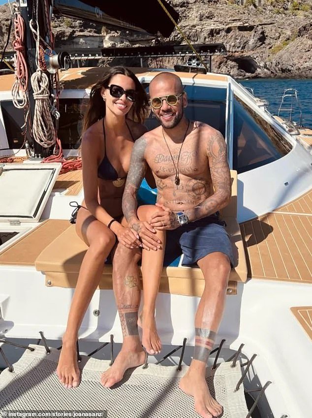 Dani Alves appears to have reconciled with wife Joana Sanz, 31, (pictured on holiday a few years ago) after being released from prison