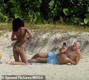 The two seemed to be enjoying their romantic trip on the island of St. Barts