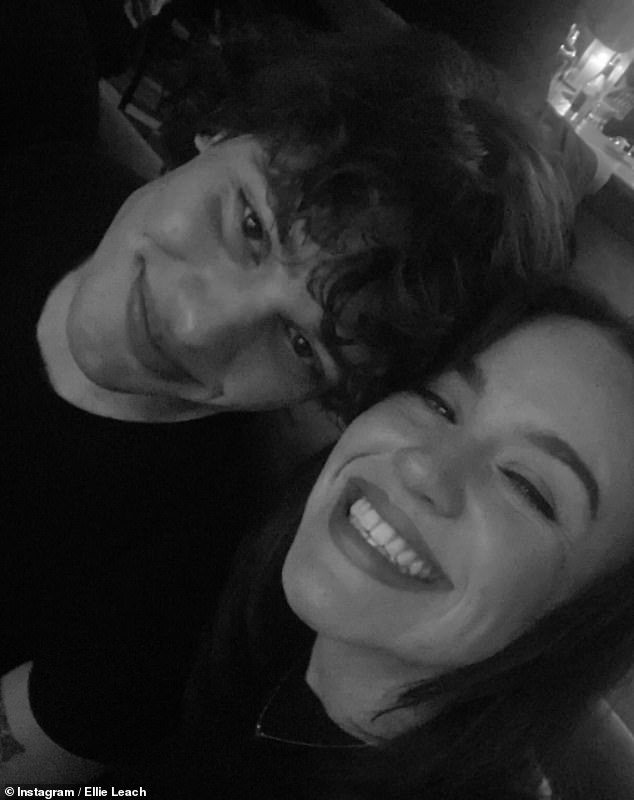 The couple looked cozy as they beamed for the loved-up black and white Instagram selfie (pictured in March)