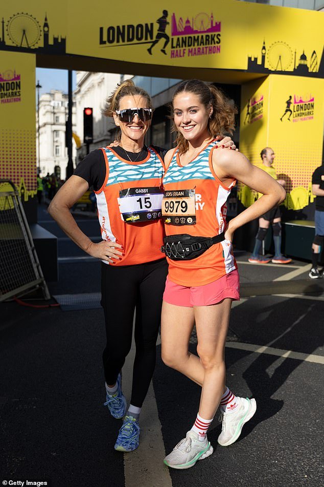 Gabby and her jumping daughter watched the race in glee as they posed for a few photos in their running gear