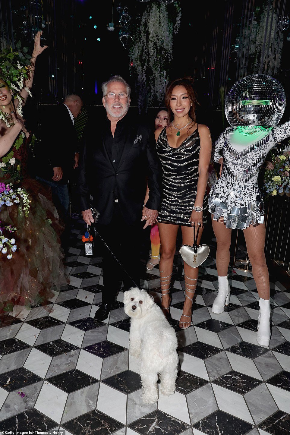 Thomas and Evelin make their grand entrance with their dog Tito