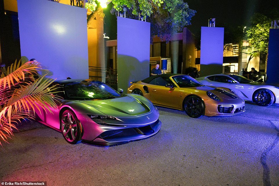 Six of Thomas's Ferraris, Porsches and Lamborghinis from his personal collection lined the outside of the club