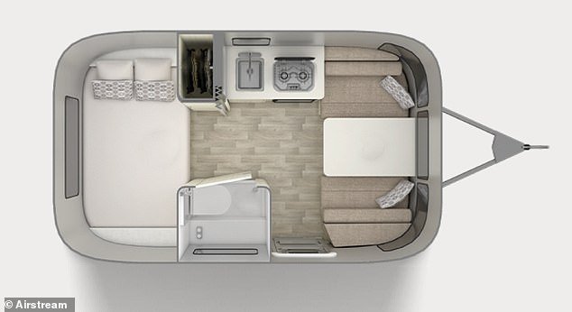 The carefully designed, relatively small camper is sixteen feet long and can accommodate four people