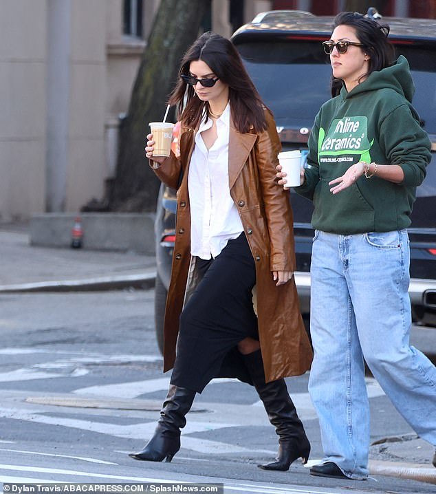 Adding inches to her statuesque figure, the ICarly alum went for a stroll through the Big Apple with a friend, wearing knee-high leather boots.