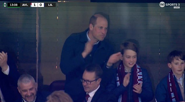 Prince George was seen wearing a burgundy and blue Aston Villa scarf and smiling after the goal