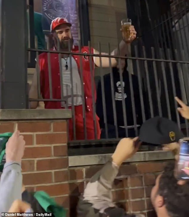 Jason Kelce raises a glass of beer to some members of his former fraternity, Sigma Sigma