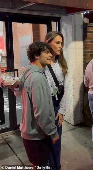 Even while a hungry husband waited for a roast beef sandwich, Kylie Kelsie took time to take photos with fans outside Jimmy John's in Over-the-Rhine on Thursday evening