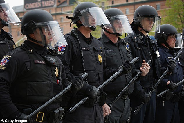 This ended a wave that began in 2015 after the death of Freddie Gray, which led to civil unrest and violence.  Riot police block a street during a march in honor of Gray, who was killed by a police officer on April 25, 2015 in Baltimore, Maryland