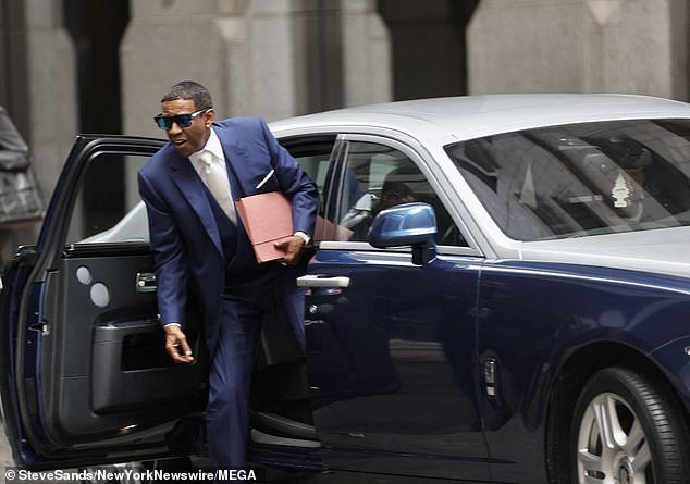 The actor emerged from the car again with a large brown envelope in his hand