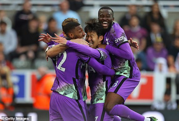 NEWCASTLE UPON TYNE, ENGLAND – OCTOBER 17: Tottenham Hotspur's Son Heung-min is heckled by teammates after scoring their third goal during the Premier League match between Newcastle United and Tottenham Hotspur at St. James Park on October 17, 2021 in Newcastle upon Tyne, England.  (Photo by James Gill - Danehouse/Getty Images)