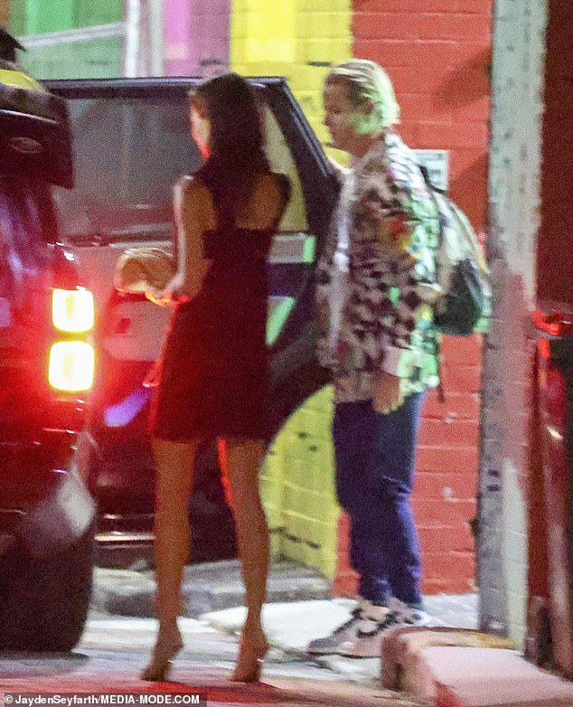 The pair were seen leaving Rushcutters Bay's Cruising Yacht Club with John, ever the gentleman, opening the car door for her.