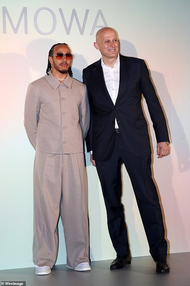 Lewis proved the close collaboration with the brand and posed next to Rimowa's CEO Hugues Bonnet-Masimbert